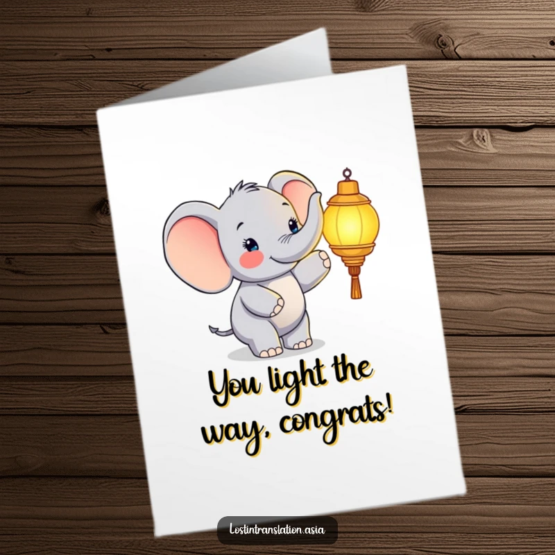 Funny free printable congratulations card with a joyful elephant pointing at a bright glowing lantern, a hopeful sign.